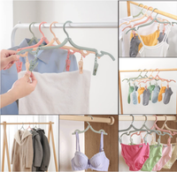 Cintres de voyage pliables portables en plastique, design compact et peu encombrant, durables, faciles à transporter, colorés, pour l'organisation de la garde-robe