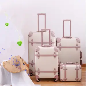 4 pieces of Beige Color PVC leather material trolley vintage mini luggage case