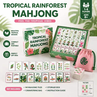 Jeu de Mahjong rose et vert tropical avec des scènes de vacances à l'île, des icônes de perroquet de la jungle, de fleur d'hibiscus et de coquillages