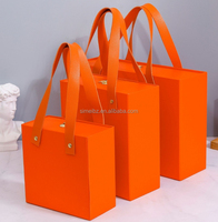 Nouvelles boîtes cadeaux de luxe rigides carrées pour cadres photo 2025 avec poignée, en matériaux recyclés, finition mate, logo personnalisé, impression CMJN sur mesure