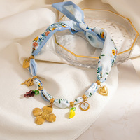 Collier multi-breloques en acier inoxydable plaqué or, style océan, coquillages et conques, étanche, collection été 2026, vente en gros de bijoux
