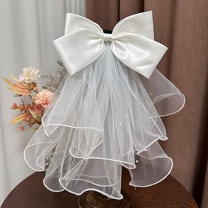 Voile de mariée court en maille ivoire avec nœud W073003, accessoire de coiffure pour la tête de la mariée - Product Image 1