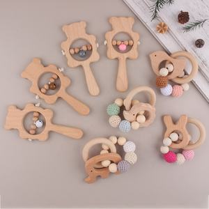 Nuevo diseño sensorial bebé dentición juguete haya mango de madera campana sonajero juguete BPA libre anillo de madera bebé mordedor para recién nacido conjunto de regalo - Product Image 1