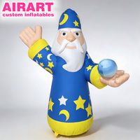 Décorations gonflables de Noël personnalisées : Père Noël avec bâton magique et robe à motifs dorés