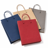 Sacs en papier écologiques avec nœud en ruban, sacs de shopping blancs pour vêtements avec logo, vente en gros