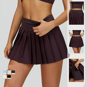 تنورة قصيرة مطوية بلون أصفر زبدي، قطعة واحدة مع جيب داخلي، مناسبة للتنس والشاطئ والرياضة واليوغا - Product Image 1