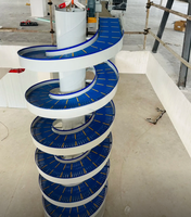 Tour de convoyeur à spirale verticale personnalisée, élévateur modulaire en plastique à chaîne spirale pour bouteilles d'huile comestible et boîtes en carton