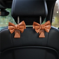 Nouveau crochet de rangement pour dossier de siège de voiture Keynew, en cuir PU, avec nœud, support universel pour sacs et sacoches, clips de fixation automobile, capacité de charge 20 kg