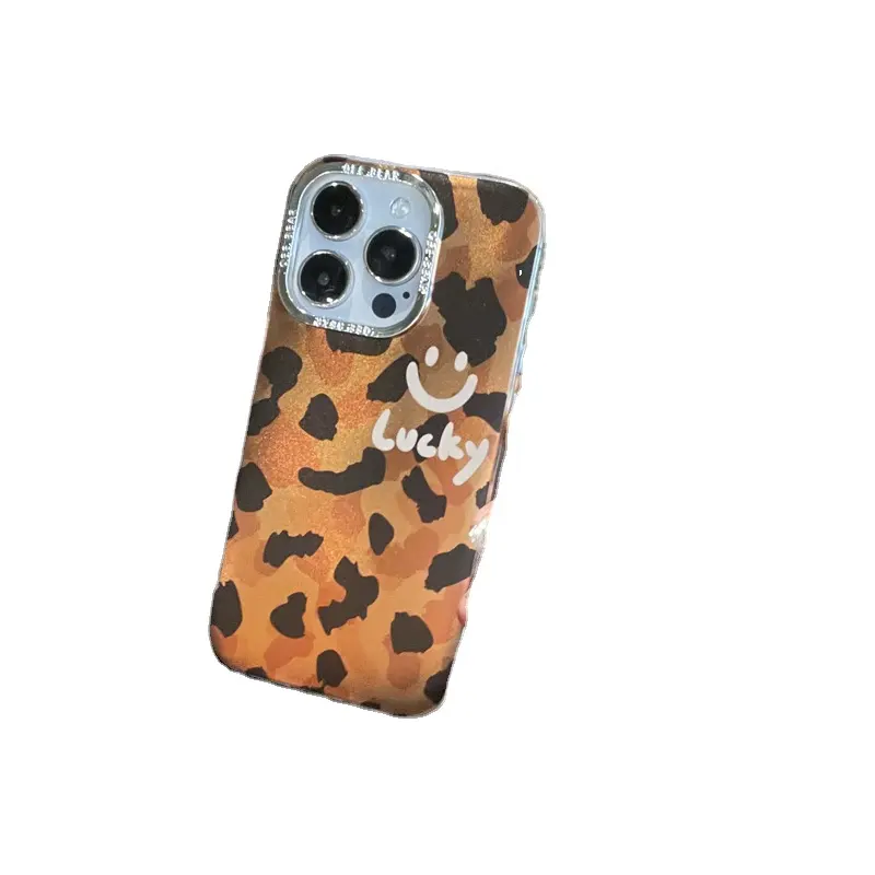 La carcasa del teléfono móvil 15promax/14Pro con cara sonriente con estampado de leopardo europeo y americano es adecuada para iPhone 11/12pro carcasa dura 15
