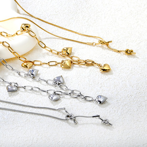 Collier avec pendentif en forme de cœur, plaqué or 18 carats, acier inoxydable, pour femme, à porter tous les jours, style simple et haut de gamme, design irrégulier en forme de cœur de pêche - Product Image 1