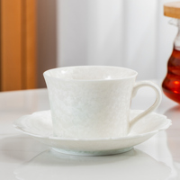 Ensemble tasse à thé et soucoupe en céramique blanche cristalline, tasse à café en porcelaine festonnée pour hôtel de luxe