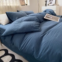 Parure de lit 4 pièces moderne couleur unie, effet lavé, douce et respirante, comprenant housse de couette, drap-housse et taies d'oreiller, pour un intérieur confortable