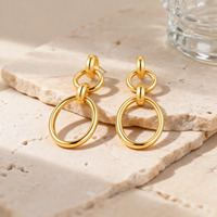 Boucles d'oreilles multi-cerceaux simples en acier inoxydable plaqué or 14 carats pour femme, au design texturé de style espagnol, tendance et au charme unique.