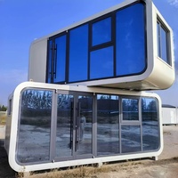 Cabines de bureau mobiles préfabriquées modernes de 20 pieds et 40 pieds, panneaux sandwich en acier, mini-maisons, chambre, salle de bain, cuisine pour villa, école