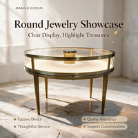 Comptoir de présentation de bijoux rond sur mesure, vitrine circulaire incurvée en verre pour bijoux, table îlot en laiton doré pour montres, boutique