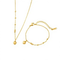 Vente en gros Nouveauté 2026 Tendance Ensemble de bijoux en acier inoxydable 304 avec perles et cœurs, comprenant bracelet de cheville, bracelet et collier, pour femmes, idéal pour cadeaux