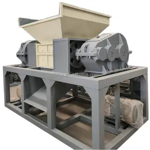 Máquina trituradora de neumáticos de plástico con cuchillas trituradoras de doble eje de bajo ruido a la venta