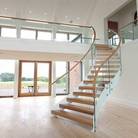 Zeitgenössisches Luxus-Treppensystem mit Holzstufen, Steinstufen und Gebogener Treppe