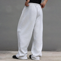Pantalon de jogging ample pour homme, coupe décontractée, jambe large, taille élastique avec cordon de serrage, poches, bas ouvert, style athlétique