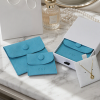 Pochette à bijoux en microfibre de velours bleu lac de luxe personnalisée ZXF de haute qualité avec bouton et insert logo