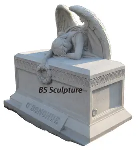 Carved European granite tombstone with angel