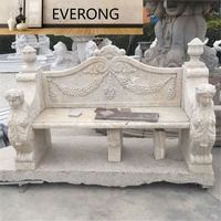 Table de jardin en marbre blanc avec banc