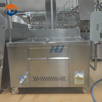 Friteuse industrielle continue Trancheuse de plantain Friteuse électrique Friteuse à vapeur de tofu pour machines de traitement des haricots