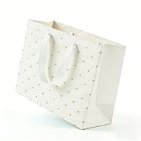 Sac cadeau gaufré en gros avec poignée en tissu, sac fourre-tout en papier coloré pour emballage de cadeaux de mariage et d'anniversaire