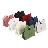 Bijoux en papier blanc de luxe personnalisé sacs fourre-tout avec poignée de ruban et logo imprimé cosmétiques anneau collier shopping sac à main