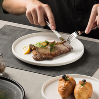Assiettes plates modernes en céramique blanche mate, écologiques, en grès, pour restaurant, fabrication OEM/ODM en gros par l'usine chinoise
