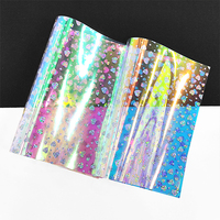 Style chaud magique couleur motif Pvc Film rouge bleu Film vinyle rouleau Transparent Pvc matériel pour sac cosmétique emballage cadeau