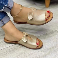 Sandales plates surdimensionnées pour femmes avec nœud décoratif et design ajouré respirant