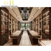 Comptoir de bijouterie au design simple, vitrine murale de luxe personnalisée en verre pour l'aménagement intérieur de bijouterie