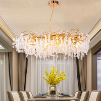 Lustre moderne de luxe en aluminium doré en cristal pour la décoration intérieure Luminaire suspendu élégant pour le salon dans une villa et un hall d'entrée
