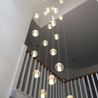 Lustre long d'escalier de Chrome d'acier inoxydable de boule de bulle en cristal de luxe caractéristique réglable de taille