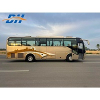 Autocar de tourisme de luxe avec 47 sièges, offrant des logements spacieux et confortables, adaptés aux voyages à courte et longue distance.