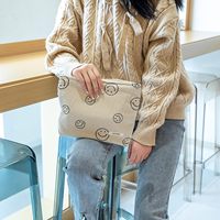 Sac de maquillage et trousse à cosmétiques pour femmes avec un design esthétique, motif visage mignon, fermeture à glissière (beige)