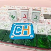 Nouvel ensemble de tuiles de mahjong de luxe avec dos émeraude, lettres directionnelles et graphismes numérotés pour le jeu familial de mahjong