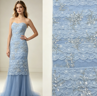 Tissu en dentelle florale bleu ciel en gros d'usine, maille de tulle perlée de sequins argentés pour robe de mariée et de soirée