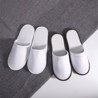 Pantoufle jetable d'hôtel de tissu de sieste bon marché en stock pantoufle de station thermale de 28cm avec la semelle d'EVA