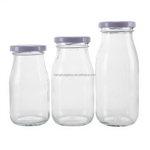 Wholesale 150ml <strong>200ml</strong> 250ml 500ml Round Glass <strong>Milk</strong> Bottles Empty Clear Fruit Juice Glass Bottle with Metal Lids - Product Image 1