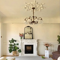 Cheminée électrique décorative murale en marbre de jade blanc sculpté à la main, design de luxe personnalisé pour l'intérieur
