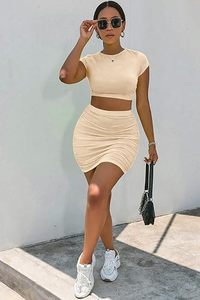 ชุดเสื้อเอวลอยและกระโปรงสั้นสีล้วนสำหรับงานปาร์ตี้สตรีทคลับชุดเดียว Comodo7 - Product Image 4