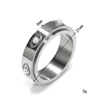Bague tournante élégante en acier inoxydable noir brossé avec incrustation de petites perles, bijou de mode quotidien pour femme