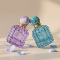 Flacon de parfum élégant en verre bleu clair de luxe haut de gamme de 100 ml, personnalisé, par Anding Supplier