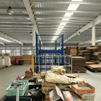 Plateforme élévatrice de fret électrique hydraulique pour le levage de marchandises, capacité de 0,1 à 50 tonnes, hauteur de 1 à 30 m, pour la manutention des matériaux en entrepôt