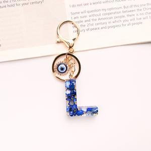 Porte-clés avec lettres œil <span class=keywords><strong>du</strong></span> <span class=keywords><strong>diable</strong></span> en résine, pendentif avec lettres, pendentif, ornement suspendu pour femmes, vente en gros et à chaud - Product Image 6