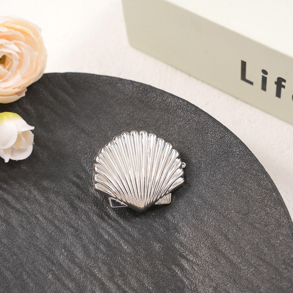 White k shell duckbill clip