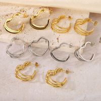 Anting-anting lingkaran wanita gaya Prancis retro emas stainless steel, elegan, geometris, mewah, dan berkesan mewah.