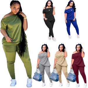 Nuova estate taglie forti abbigliamento donna tinta unita con spalle Oblique manica corta rivetto decorazione due pezzi pantaloni Set - Product Image 1